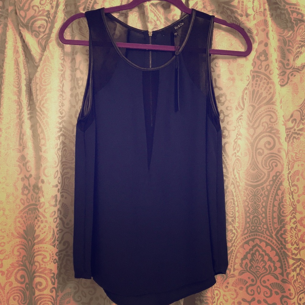 Boutique sheer and leather top